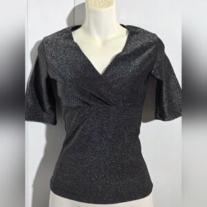 Blouse dark gray After washing, it shrunk to size XS.